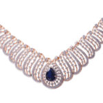 Elegant Diamond Necklace with Blue Stone
