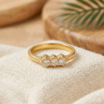 RADIANT THREE STONE GOLD RING - 22K JEWELLERY