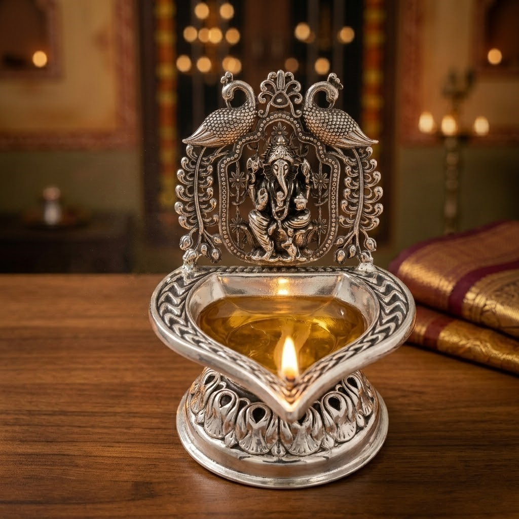 PEACOCK CROWN GANESH SILVER DIYA - 925 STERLING SILVER PEACOCK CROWN GANESH SILVER DIYA - 925 STERLING SILVER